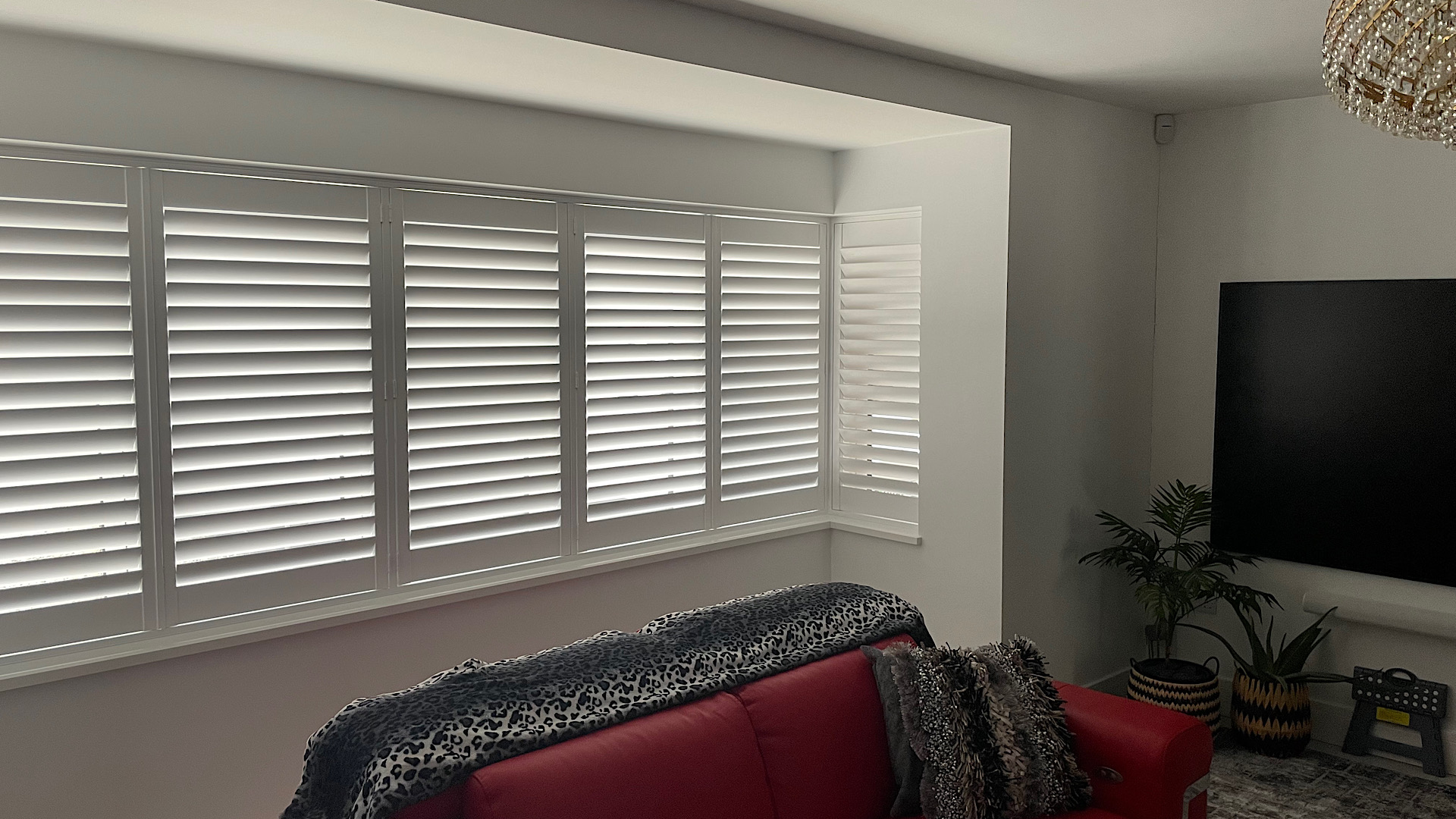 Full height shutters in a living room
